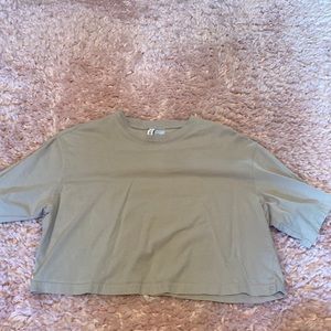 Tan divided cropped tee.